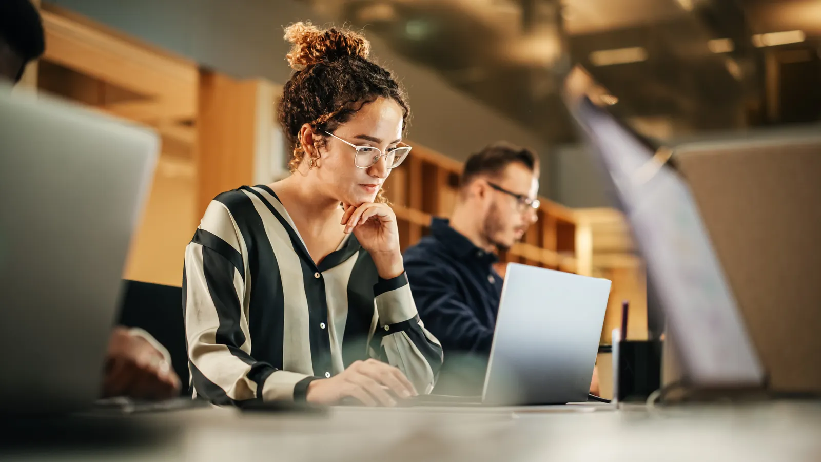 Companies struggle to turn AI productivity gains into profits: EY