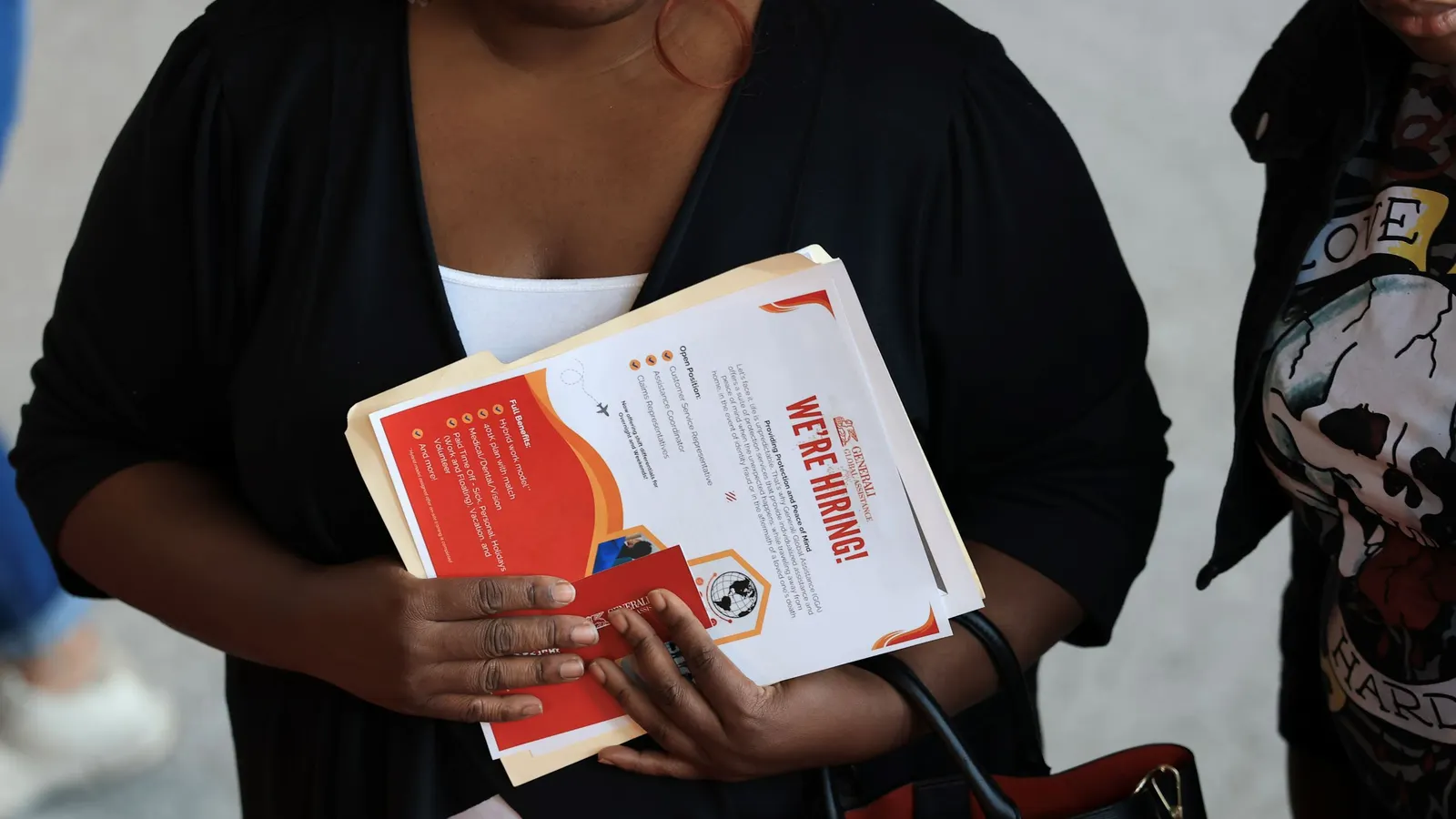 Hiring caution persists as inflation holds on, BLS report shows